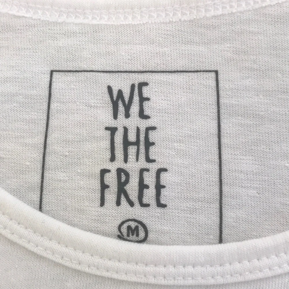 NWT! WE THE FREE Size M white short sleeve oversized top